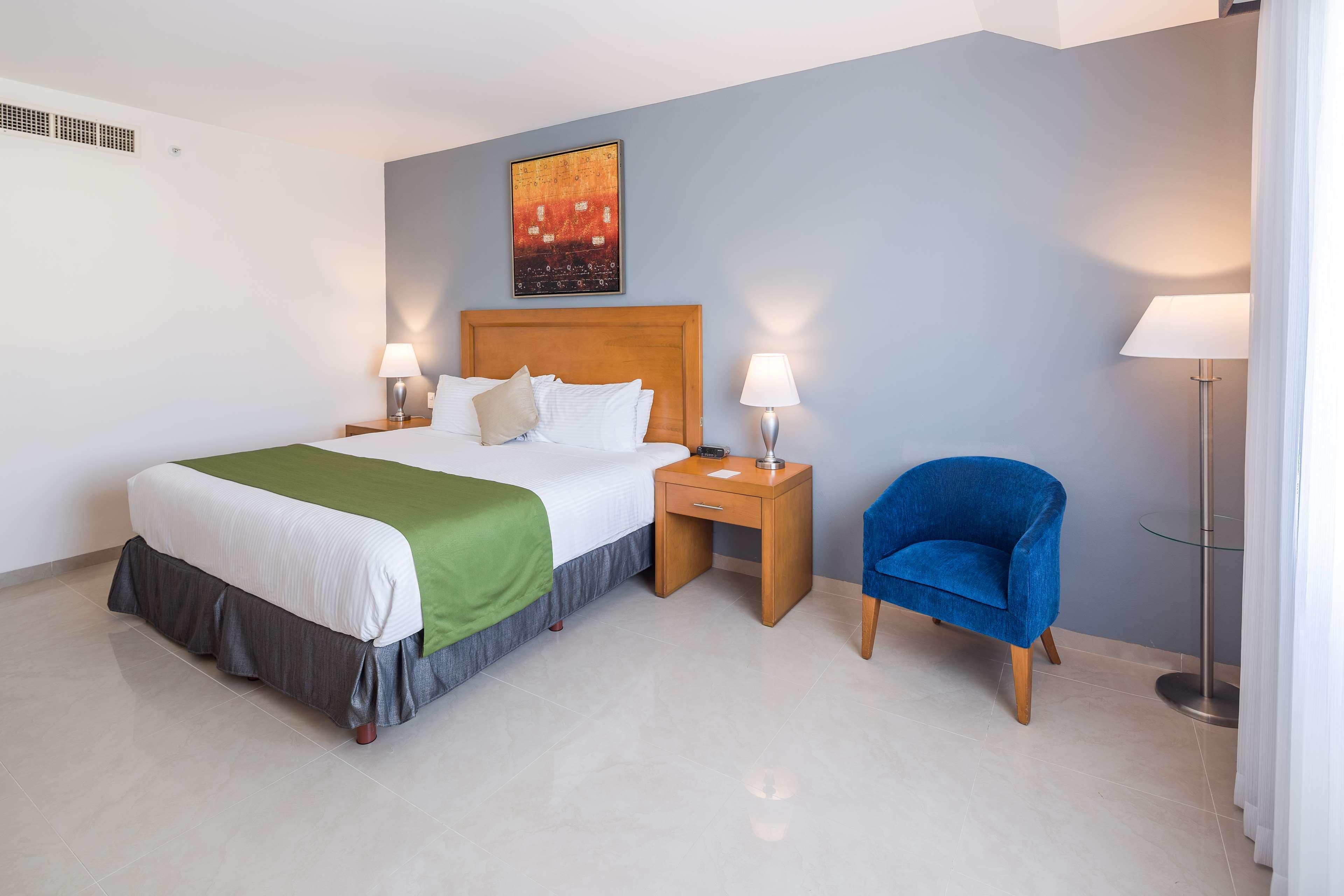 Hotel Wyndham Garden Playa del Carmen Exterior foto A bedroom at the hotel